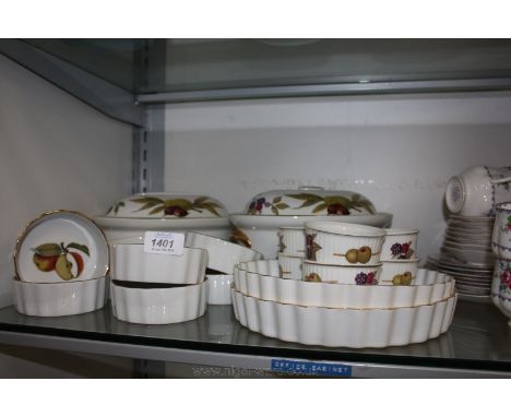 A quantity of Royal Worcester Evesham tableware including two lidded Tureens, two flan Dishes, eight medium Ramekins and six 