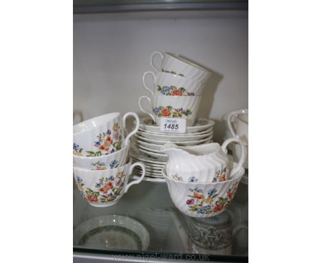 An Aynsley 'Cottage Garden' part Teaset including five Cups, six saucers, six Plates, Sugar Bowl and Milk Jag