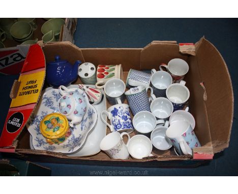 A quantity of china including eight Villeroy & Boch Switch mugs, Emma Bridgewater mug, Whittard's teapot and matching mug, Ro