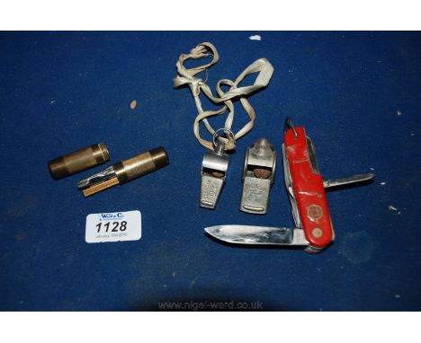Two old Whistles by The Acme Ltd., a multi gadget Penknife and a small brass Tube containing various tools