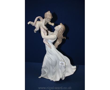A large Lladro figure - 18'' high  ''My Little Sweetie'' - a girl holding a child aloft.  Juan Carlos, Ferri Herrerc designer