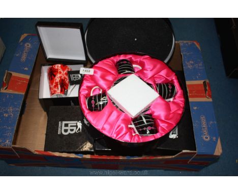 Six boxed Mugs from the Llewelyn Bowen Collection by Royal Worcester in various designs and a boxed set of Llewelyn Bowen cof