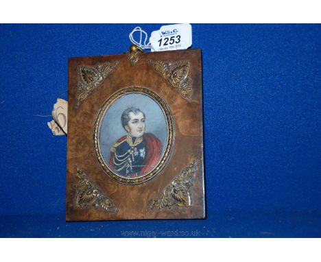 A Portrait Miniature of the young Napoleon Bonaparte.  Signed ''Leroy''; mounted in a walnut veneered frame with ormolu detai