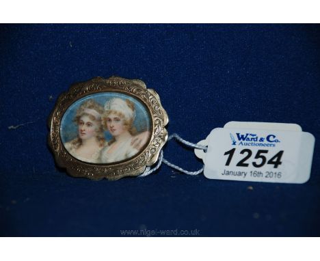 A rolled gold framed Portrait miniature Brooch/Pendant, of two young ladies, probably sisters, 1'' x 1 3/8'' engraved verso M