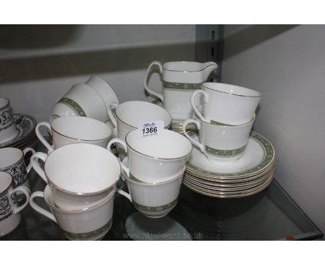 A Royal Doulton 'Rondeley' pattern part Teaset comprising twelve tea cups and saucers, ten side plates and a milk jug.