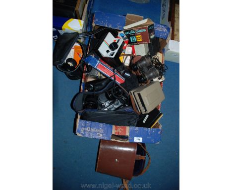 A quantity of Cameras including a Prinz GT7 Flashmatic, Polaroid 600 land camera, Polaroid 1000 Land camera, a Casina CT 1A c