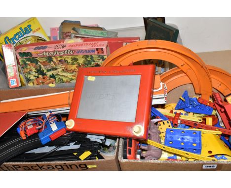 THREE BOXES OF VINTAGE TOYS AND GAMES, to include a Bayko Building set, a quantity of Matchbox racing track and two hand held