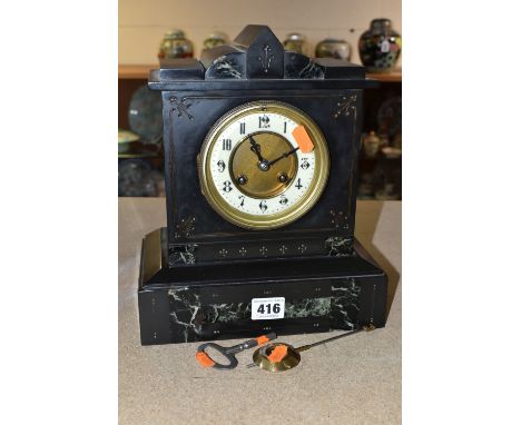A BLACK SLATE MANTEL CLOCK, the case of architectural form with inlaid black and green/blue marble bands and foliate details,