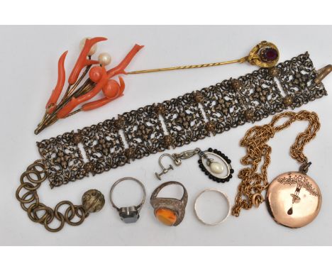 ASSORTED JEWELLERY, to include a base metal stick pin in the form of a belt and buckle set with a red paste, a gold front and