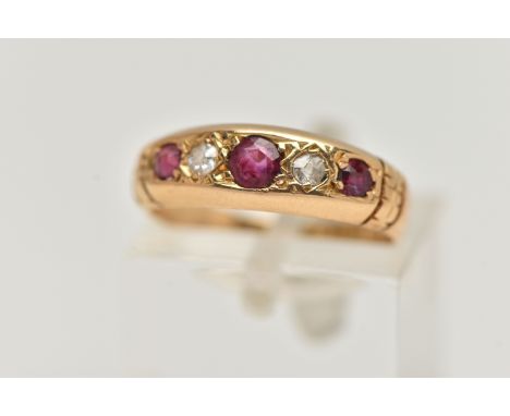 AN EARLY 20TH CENTURY, 18CT GOLD RUBY AND DIAMOND FIVE STONE RING, set with three circular cut rubies, interspaced with two o