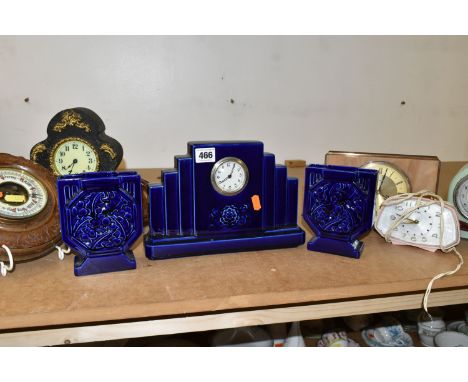A GROUP OF CLOCKS AND BAROMETERS, comprising a Digoin Sarreguemines Art Deco ceramic clock garniture in cobalt blue, marked t