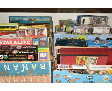 FOUR BOXES OF VINTAGE BOARD GAMES AND JIGSAWS, to include several game boards, Touring England, Touring Scotland, Touring Eur