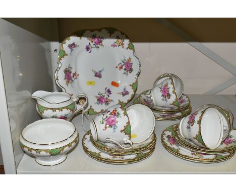 AN AYNSLEY FLORAL PATTERN PART TEA SET, comprising of six cups, saucers and side plates, twin handled sandwich plate, milk ju