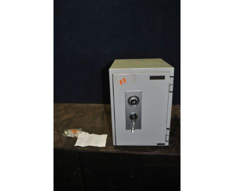A 'ROYAL SAFE' MANUAL SAFE with key and code width 34cm depth 42cm height 51cm
