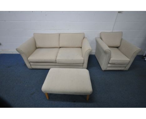 A BEIGE UPHOLSTERED THREE PIECE LOUNGE SUITE, comprising a two seater sofa, length 173cm x depth 88cm x height 65cm, an armch
