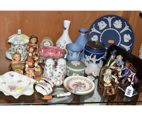 A FIGURE GROUP BY WILL YOUNG FOR RUNNAFORD POTTERY, showing characters from the song Widdecombe Fair along with another figur