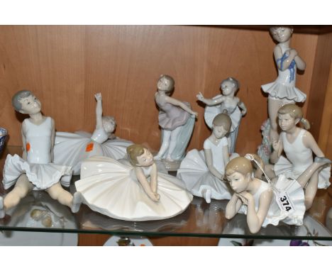 NINE NAO FIGURES OF BALLERINAS, in different poses, tallest standing ballerina holding shoes 29cm, other figures dancing or r