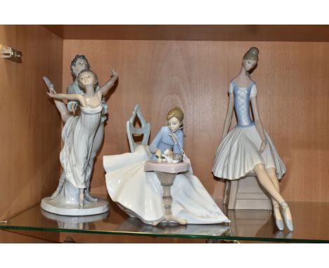 THREE NAO FIGURES/FIGURE GROUPS, comprising Dancing on a Cloud, Playing with Kitty and Seated Ballerina, height of tallest 34