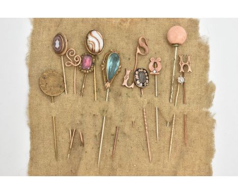 A SELECTION OF STICK PINS, thirteen in total to include a gold plated mourning pin, black enamel surround inscribed 'In Memor