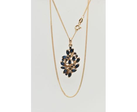 A 9CT GOLD SAPPHIRE PENDANT NECKLACE, abstract pendant set with marquise cut and circular cut blue sapphires, fitted with a t