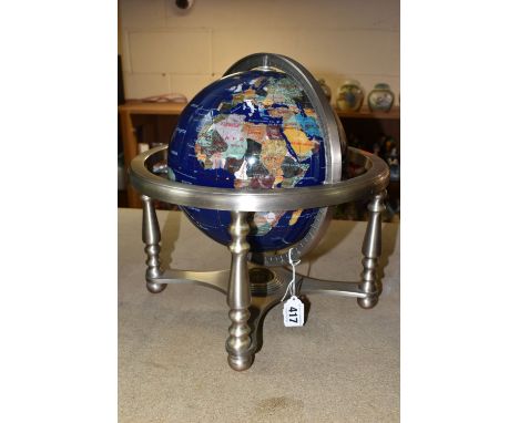 A MODERN TABLE GLOBE, probably dating from early this century due to country names, countries delineated by different natural