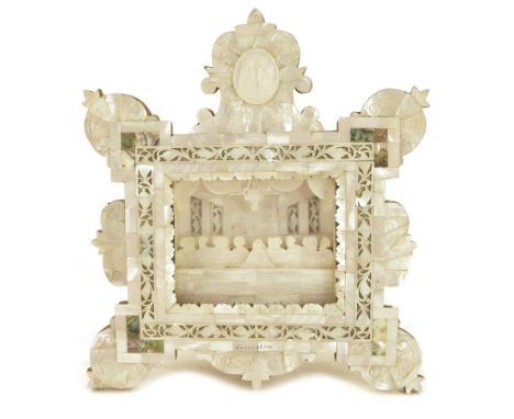 A late 19th century Jerusalem mother of pearl diorama of the Last Supper, with engraved decoration and inscribed 'JERUSALEM',