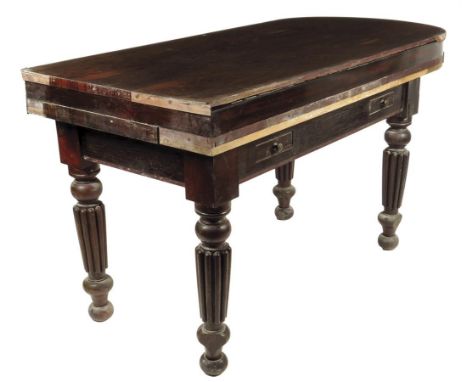 λ A William IV rosewood country house bagatelle table, the lift-off top revealing a baize lined playing surface with brass po