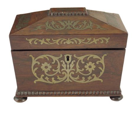 λ A George IV rosewood and brass marquetry tea caddy, with nulled mouldings, the interior with twin lidded divisions, 16cm hi