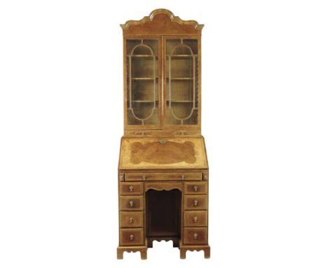A burr walnut bureau bookcase in early 18th century style by Elsie Robinson, crossbanded and inlaid feather stringing with a 