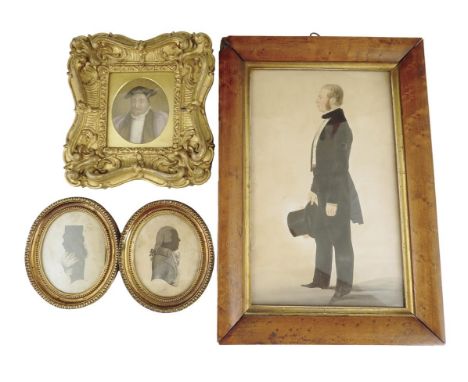 An early Victorian watercolour full length portrait of a gentleman, in a top hat and tails, with a blindstamp to bottom left 