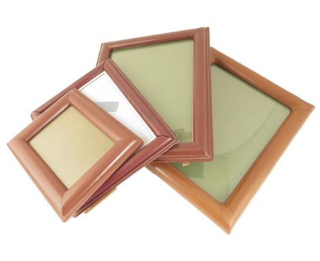Four French leather photograph frames, each with an easel back, 35.5cm x 29.6cm. (4)