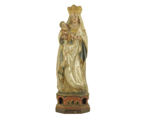 A 17th century Utrecht polychrome decorated terre de pipe figure of the Madonna and child, 18cm high.