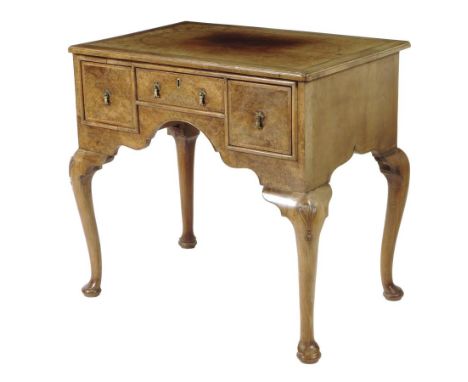 A walnut and burr walnut lowboy in early 18th century style by Elsie Robinson, cross and feather banded the quarter veneered 