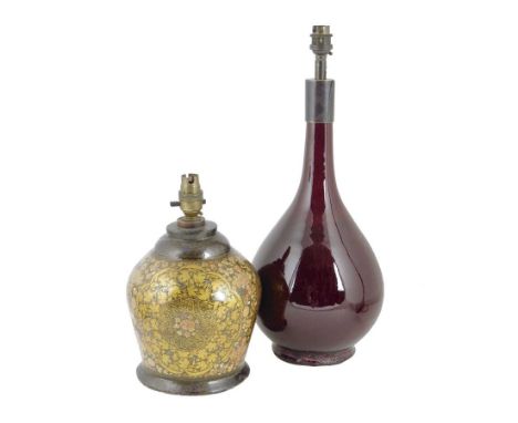 A Chinese porcelain sang de boeuf table lamp, 47cm high, together with a Kashmiri lacquer table lamp. (2)