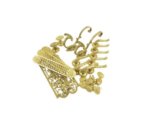 A large collection of brass and ormolu door furniture, including: door plates, handles, decorative mounts and curtain ties, t