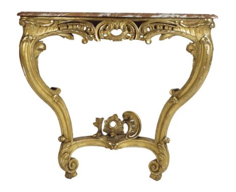A pair of Louis XV style carved giltwood console tables, each with a rouge royal serpentine marble top, above a rocaille and 