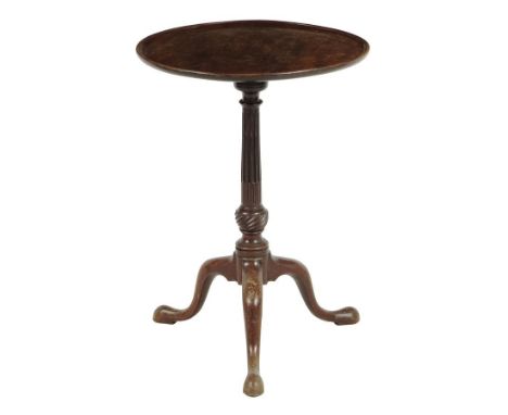 A mahogany tripod table, the circular dished tilt-top on a stop fluted stem and spiral bowl, George III and later, 69.2cm hig