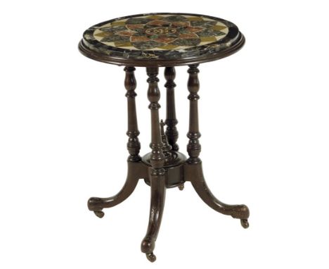 A Victorian occasional table, with a specimen marble top on an ebonized base with turned columns and ceramic castors, 71cm hi