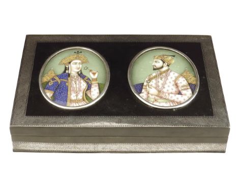 An Indian Bidri ware box, the hinged lid with two oval portrait miniatures of Shah Jahan and Mumtaz Mahal, 5.2cm high, 29.2cm