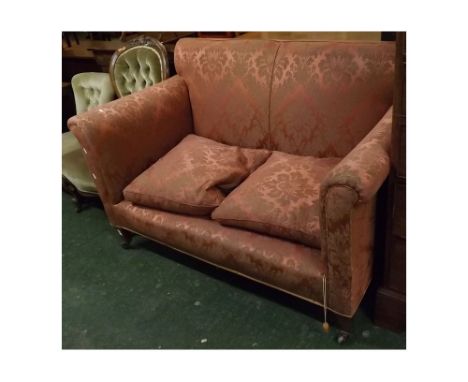 19th century mahogany framed drop end sofa with puce and foliage upholstery, raised on tapering square legs and brass casters