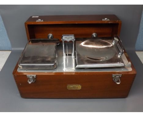 Mahogany cased set of D T & Avery Ltd County of Devon weighing scales, 21 ins wide x 11 ins deep and 11 ins high 
