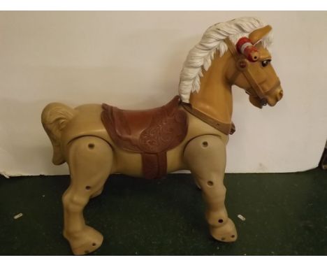 Marx Toys plastic framed child's wheeled horse with turned handles, 25" wide x 25" tall 