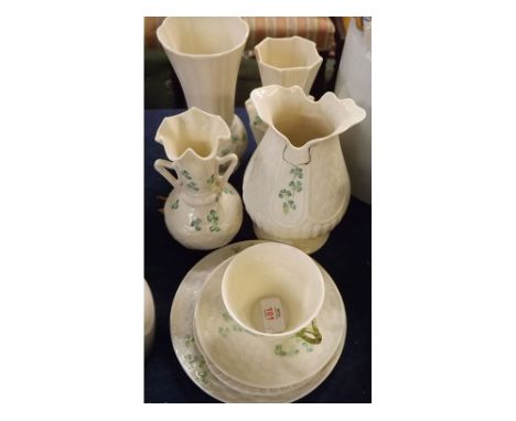 Collection of modern Belleek "Shamrock" design wares: cup, two saucers, plate and four various vases  