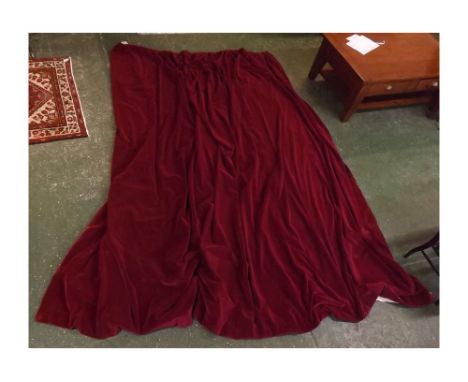Pair of extremely large red velvet curtains with approximately 118ins drop and each curtain approximately 125ins wide, togeth