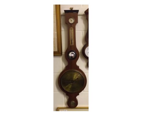 Mahogany cased wheel barometer, signed Bush - London, and set with silvered hygrometer, thermometer, convex mirror, engraved 