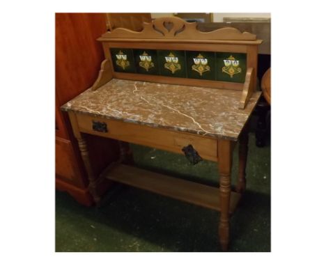 Edwardian satinwood marble top and green tiled back washstand, fitted with single drawer, open shelf, on four turned feet, on