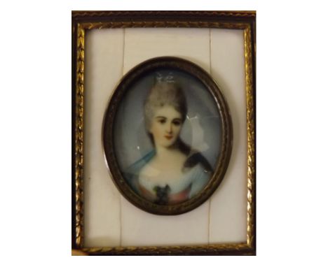 20th century Continental portrait miniature, head and shoulders portrait of a lady, 2 x 1 1/2 ins  