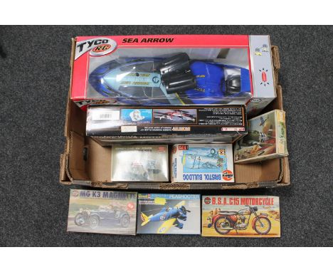 A box containing eight assorted modelling kits including aircraft, BSA motorcycle, MG car, together with a remote controlled 