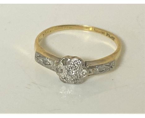 An 18ct gold diamond set ring, size M. CONDITION REPORT: 2.3g