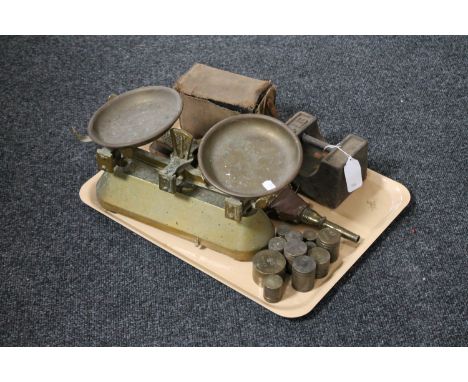 A tray of antique pan, kitchen scales, assorted weights, brass embossed bellows, vintage camera 